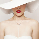 Model wearing an Infinity Necklace 925 Sterling Silver with a delicate infinity pendant, showcasing timeless elegance.