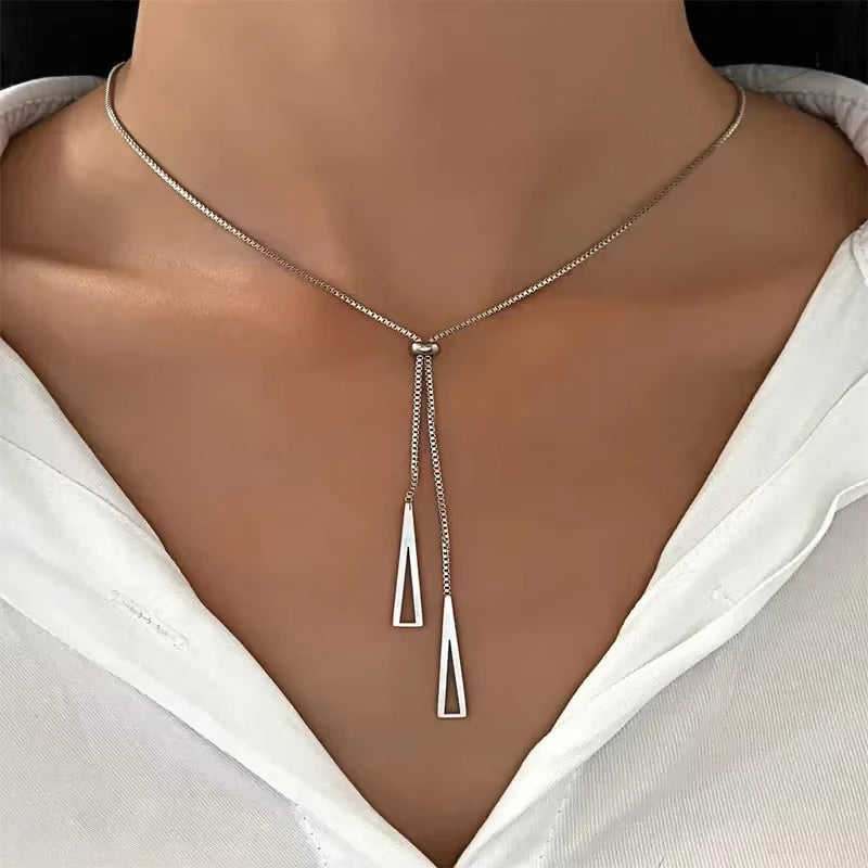 Silver Triangle Pendant Necklace worn on model