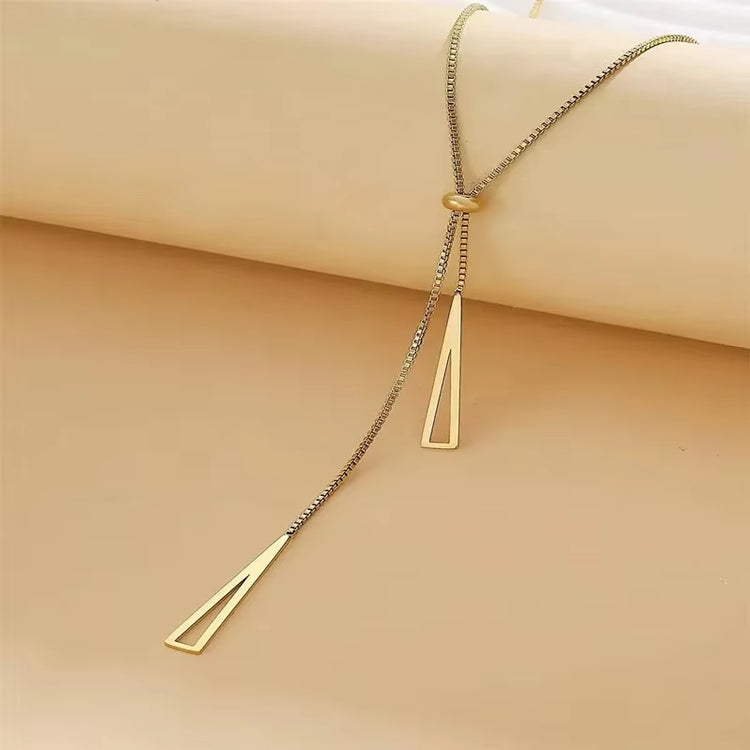 Silver Triangle Pendant Necklace worn on neckline