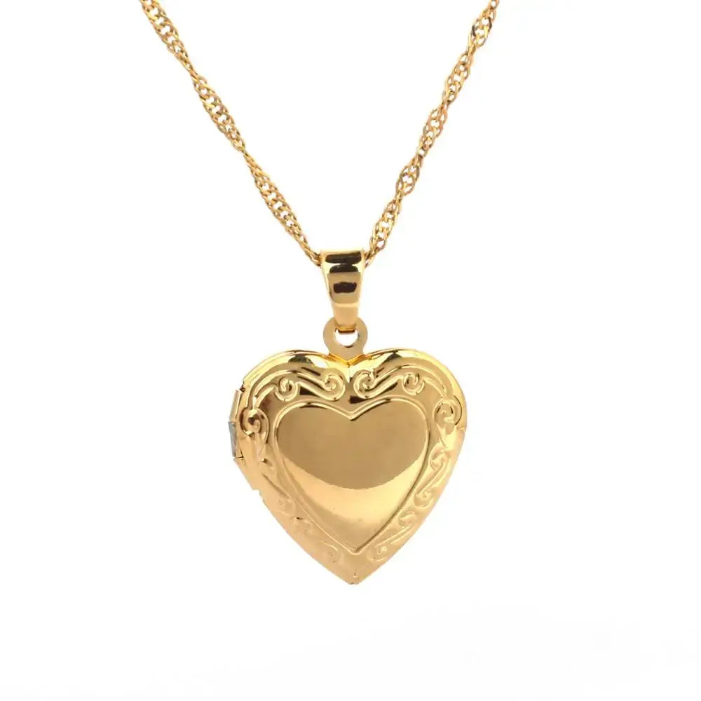 24K Gold Heart Locket Pendant Necklace on a delicate chain showcasing a polished golden finish.