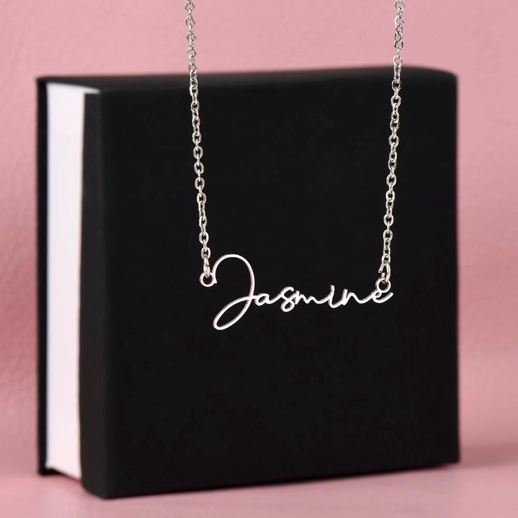 Personalized name necklace displayed with the name &