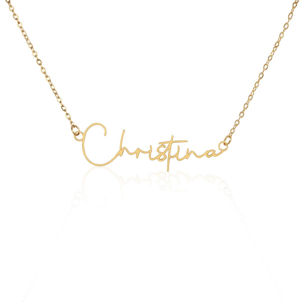 Personalized name necklace featuring a custom gold script design that spells &
