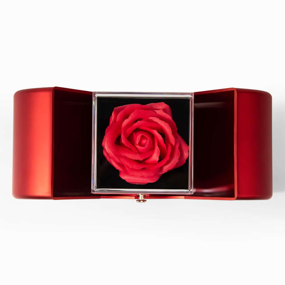Red gift box with a glass top displaying a beautiful rose, perfect for presenting a Gold Finish Pendant Necklace I Love You Message Box.