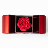 Red gift box with a glass top displaying a beautiful rose, perfect for presenting a Gold Finish Pendant Necklace I Love You Message Box.